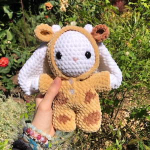 fluffy crochet bunny in cow onesie plush
