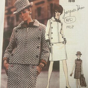 May include: A Vogue Paris Original sewing pattern envelope featuring Jacques Heim designs from 1968. The cover displays a black and white herringbone jacket and skirt set, a white double-breasted suit illustration, and a sleeveless dress sketch.