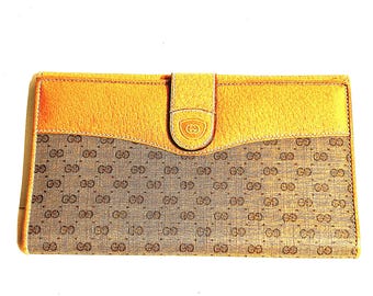 Cartera Gucci Guccissimo Micro GG de piel y lona