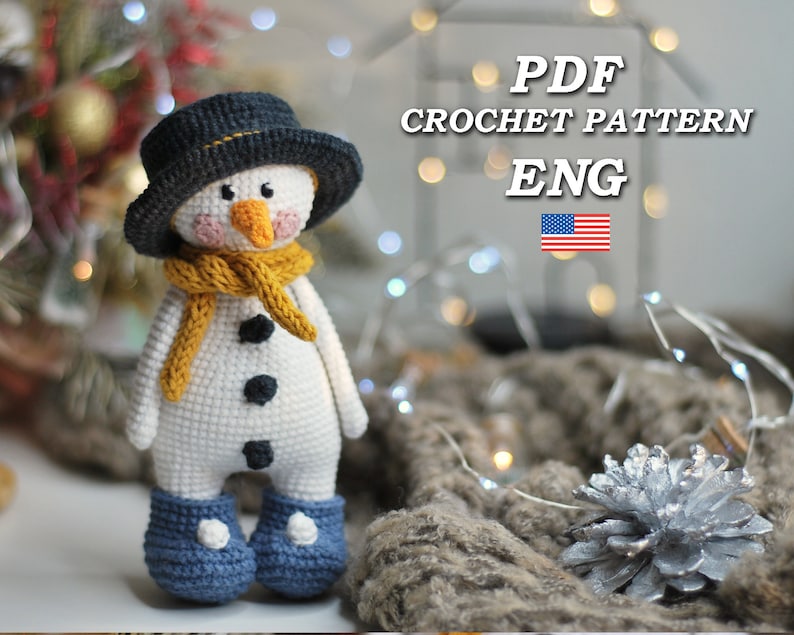May include: Crochet pattern for a snowman amigurumi toy. The pattern is in English and includes instructions for making a snowman with a black hat, yellow scarf, and blue boots. The pattern is available as a PDF download.