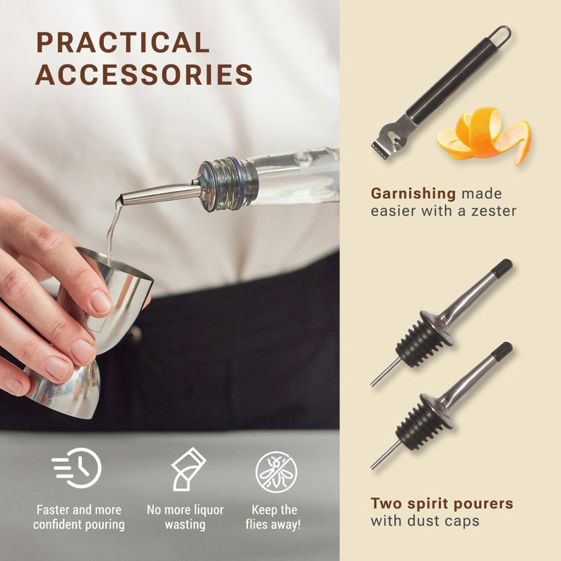 May include: A set of bar accessories including two spirit pourers with dust caps, a zester, and a jigger. The pourers are silver with black caps. The zester is black with a silver handle. The jigger is silver and is being used to measure out liquor from a bottle.