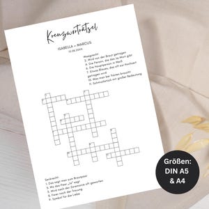 Può includere: Un foglio di cruciverba bianco con il titolo "Kreuzworträtsel" e i nomi Isabella e Marcus, datato 15.08.20XX. Il foglio include indizi in tedesco ed è disponibile nei formati DIN A5 e A4.