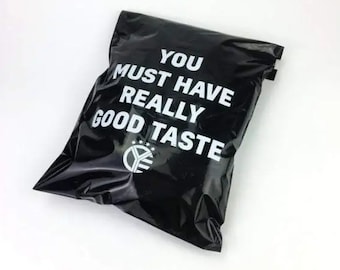 May include: Black poly mailer with white text that reads "You must have really good taste" and a logo with a star and the letters "YE".