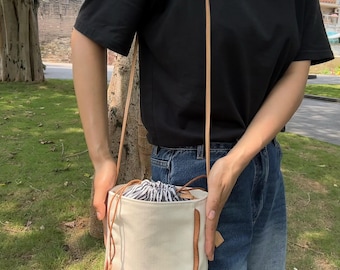 Bolso bandolera de lona y cuero hecho a mano