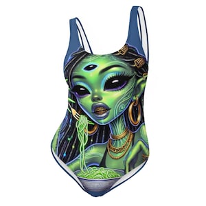 May include: A blue swimsuit with a green alien woman wearing gold jewelry and eating noodles from a bowl.