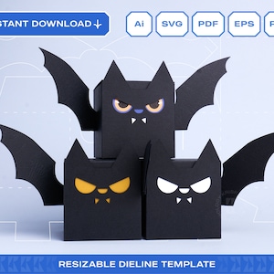 Puede incluir: Tres cajas negras con forma de murciélago con alas troqueladas. Las cajas tienen diferentes expresiones faciales con ojos amarillos y blancos. Las cajas están etiquetadas con "RESIZABLE DIELINE TEMPLATE".
