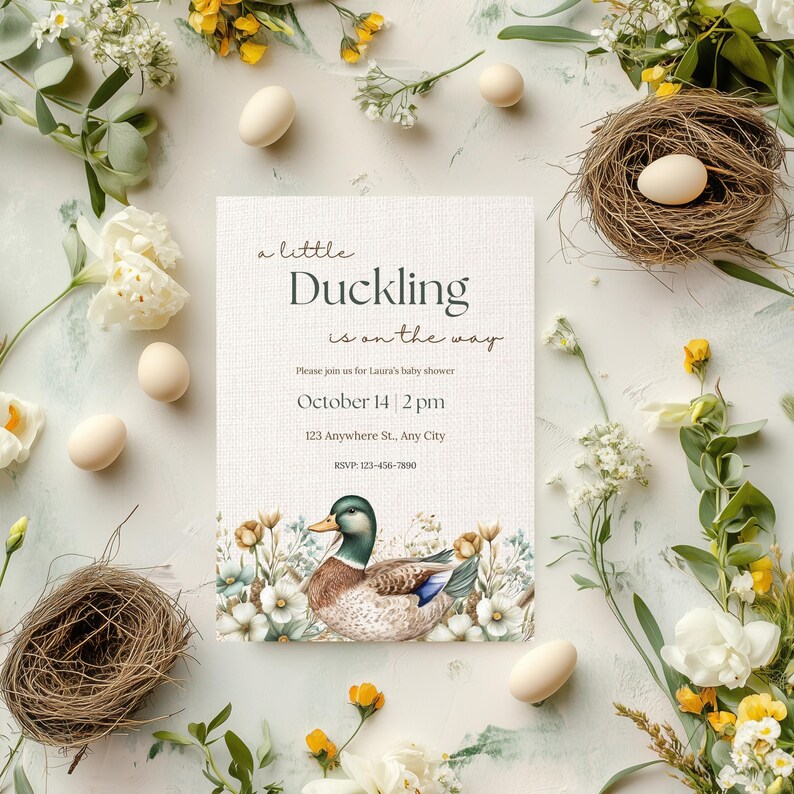 May include: A baby shower invitation with a watercolor illustration of a duckling in a nest of flowers. The text reads "a little Duckling is on the way". The invitation includes the date, time, and location of the shower.