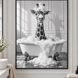 May include: A black and white wall art print featuring a giraffe sitting in a clawfoot bathtub filled with bubbles. The giraffe has foam on its head and nose, and a small rubber duck sits in the bubbles. The text reads HIGH-RESOLUTION | INSTANT DOWNLOAD.