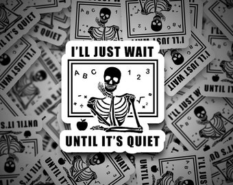 May include: Black and white sticker with a skeleton sitting at a desk with the text "I'll just wait until it's quiet".