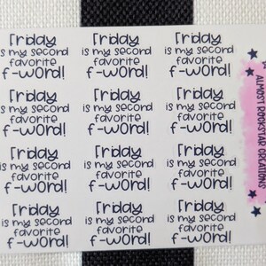May include: A sheet of white stickers with the text "Friday is my second favourite f-word!" repeated. The stickers have a pink and purple accent with the text "Almost Rockstar Creations" and star graphics.