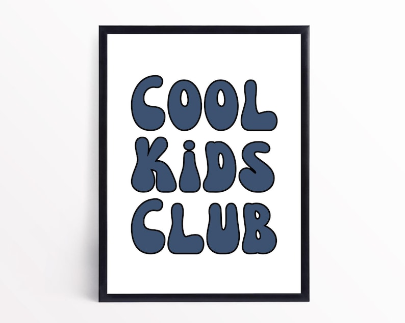 May include: A framed print with the text "COOL KIDS CLUB" in a blue, retro font style.