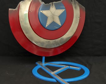 Broken Warrior Shield Replica: Battle-Damaged Round Metal Display Prop