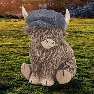 Highland Kuh Figur mit Schiebermütze
