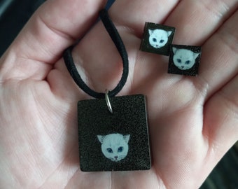 Juego de pendientes y collar de resina blanca para gatos