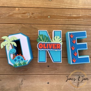 Letras 3D personalizadas para fiesta de cumpleaños de dinosaurio para niño, decoración personalizada para cumpleaños de dinosaurio para niño, letras ONE, fiesta de cumpleaños de dinosaurio azul y naranja