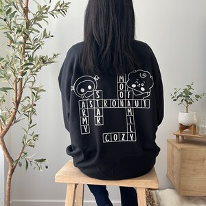 The Astronaut Crossword Puzzle Sweater Etsy The Astronaut Crossword Puzzle Sweater Etsy