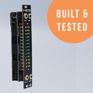 May include: A black V-Meter module with a row of LEDs that display voltage levels. The module has input and output jacks labeled "IN L", "IN R", "OUT L", and "OUT R".