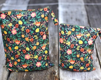 Black floral wet bag, waterproof lined zipper bag with snap strap, Rifle Paper Co fabric, forage bag, napkin bag, diaper bag