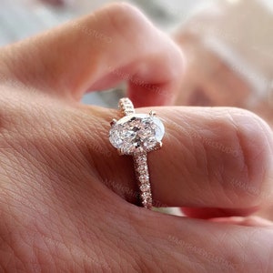 Oval-Cut Lab Grown Diamond Hidden Halo Engagement Ring And Oval Diamonds Matching Band Set Made In 18K Yellow Gold For Her