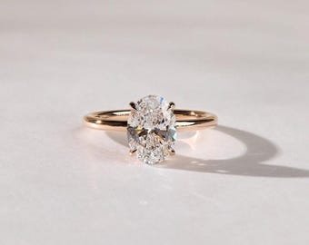 Oval Lab Grown Diamond Hidden Halo 14K Yellow Gold Engagement Ring