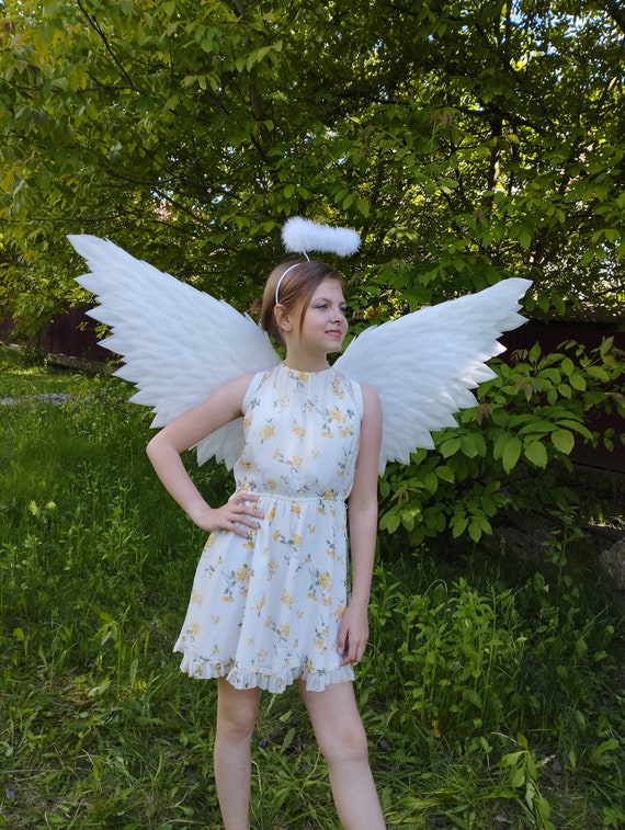 dress like an angel Forum Novelties Women's and Halo Costume Kit, White, XL Look no further than the Simply Divine Costume for Adults White Angel Wings and Halo