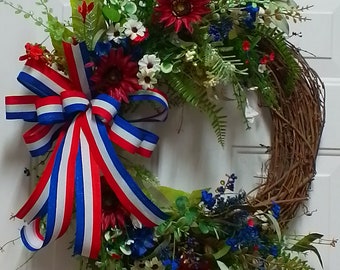 Red,white and blue patriotic floral wreath for your front door.Patriotic grapevine floral and greenery wreath. July 4th,memorial day decor.