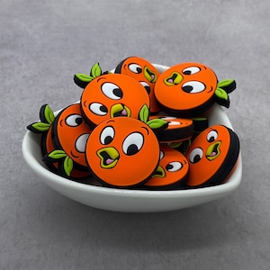 Cuenta focal de silicona de doble cara de Citrus Bird