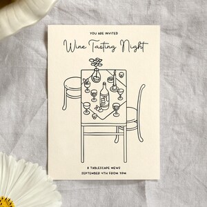 May include: A black and white illustration of a table setting with wine glasses, a bottle of wine, and a candle. The text "You are invited Wine Tasting Night 8 Tablescape Mews September 4th from 3PM" is printed on the card.