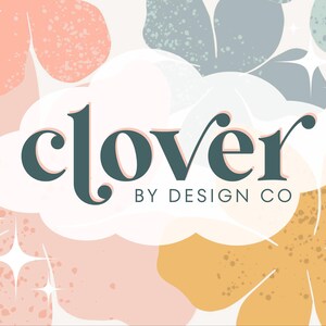 May include: The Clover By Design Co. logo is displayed against a backdrop of abstract floral shapes in pastel colors. The word "clover" is in a dark teal script, with "BY DESIGN CO" below it.