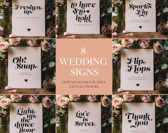 May include: Eight printable wedding signs with a whimsical retro font. The signs feature phrases like "Freshen Ups", "Oh! Snap", "To Have & To Hold", "Sparks Fly", "Flip Flops", "Light Up The Dance Floor", "Love Is Sweet", and "Thank You".