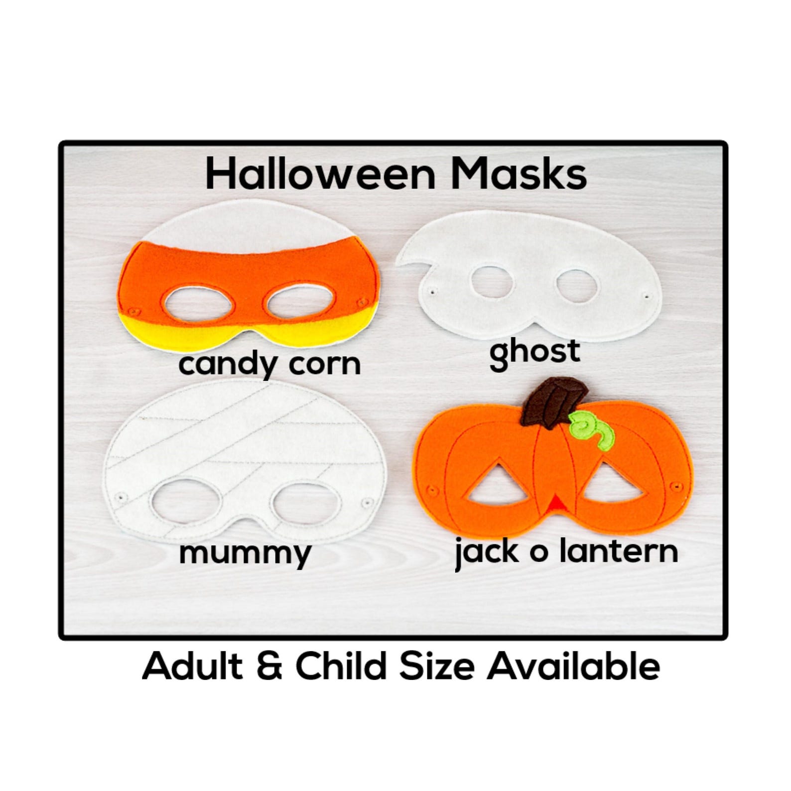 Candy corn and other Halloween felt eye masks displayed together.