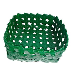 May include: A square-shaped basket featuring a woven construction made from flat, green strips. The design includes an open grid pattern throughout the sides and base, creating a consistent, uniform texture across the entire object.