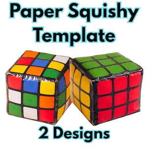 May include: Two paper squishy templates shaped like cubes with a grid pattern resembling a puzzle. The text Paper Squishy Template and 2 Designs is printed in black with a light blue outline. The cubes feature red, blue, green, yellow, and white squares.