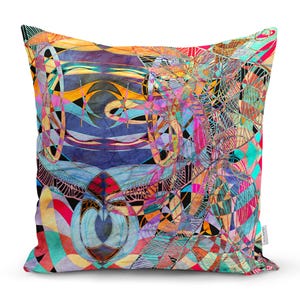 May include: A colourful throw pillow with an abstract geometric design featuring a mix of blue, pink, yellow, green, and orange hues.