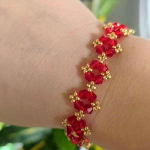 Handmade Ruby Beaded Bracelet: Red Crystals with Gold Beads