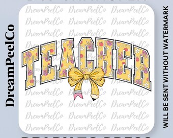 May include: A DTF transfer design with the word "TEACHER" in yellow block letters, decorated with floral patterns and a yellow bow. The design includes pencils and apples. The text "READY TO PRESS" is at the bottom.