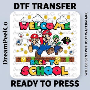 May include: A colorful DTF transfer featuring Mario, Luigi, and another character, with the words "WELCOME" and "BACK TO SCHOOL". The design includes coins, stars, and clouds. The text "READY TO PRESS" is also included.