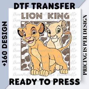 May include: DTF transfer featuring a cartoon illustration of Simba and Nala from The Lion King. The design includes the text "LION KING" and "READY TO PRESS". The image is on a white background with brown spots.