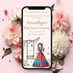 May include: A digital invitation for a Half Saree Ceremony for Aaradhya. The invitation features a cartoon illustration of a girl in a colorful saree on a swing. The text reads "Mr Ganesh & Mrs. Divya cordially invite to grace the blessed occasion of our daughter Aaradhya's Half Saree Ceremony Friday, Dec 10th, 5:00 PM Plano Clubhouse, Springhill, TX"