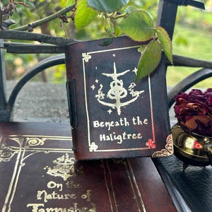 Mini Elden Ring Grimoire, Handbound, Leather, Tea-Stained Paper with Illustrations. Approx A8, 2x3 inches