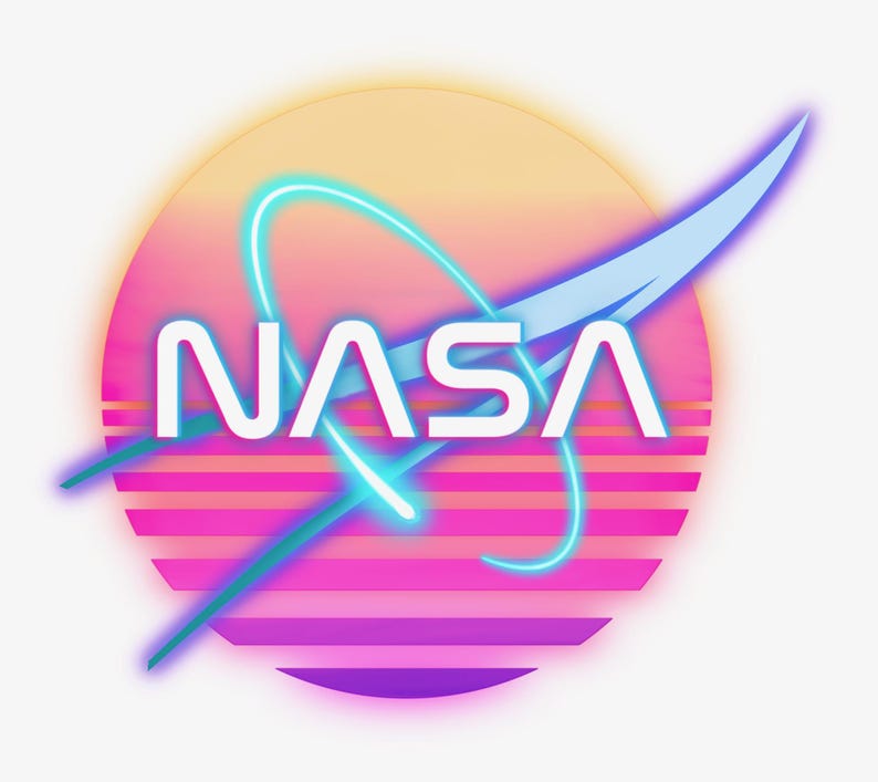 May include: A retro-style NASA logo design. The logo features the word "NASA" in white, set against a vibrant backdrop of a pink and purple striped circle with a yellow and orange gradient at the top. A blue and teal swoosh and curved lines complete the design.