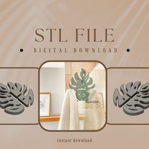 Könnte beinhalten: Ein Bild mit einem grauen Monstera-Blatt-Design, das als STL-Datei zum digitalen Download angeboten wird. Das Design wird in drei verschiedenen Ansichten gezeigt, wobei das zentrale Bild das Blatt als Handtuchhaken in einem Badezimmer zeigt. Der Text "STL FILE DIGITAL DOWNLOAD" ist zu sehen.