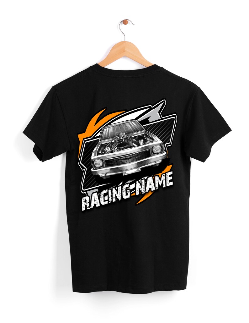 May include: Black t-shirt with a graphic of a silver muscle car with an open hood and the text "RACING-NAME" in orange.