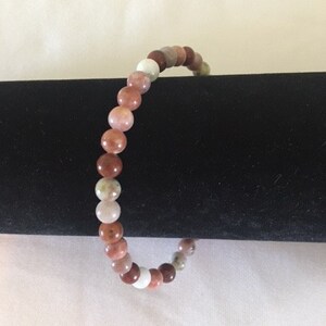 Brown/red bead bracelet 9.5"