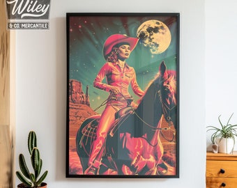 May include: A framed print of a woman in a red cowboy hat riding a horse. The background is a colorful, abstract landscape with a large moon.