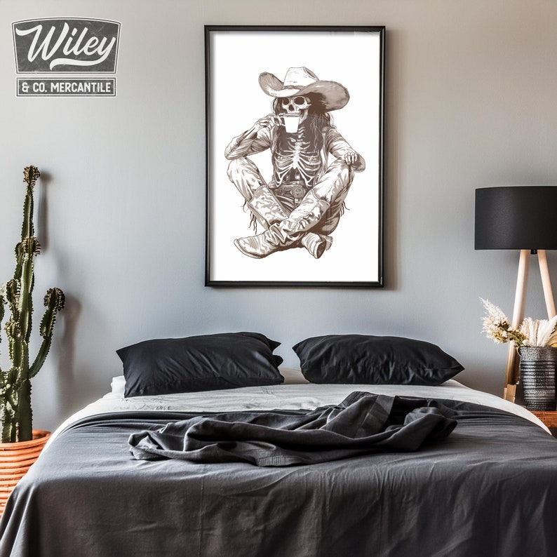 May include: A black and white illustration of a skeleton wearing a cowboy hat and boots, sitting with a cup in hand.