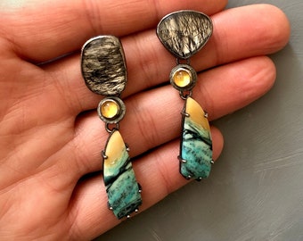 Unique, one of a kind Tourmalated Quartz, Citrine, and Opalized wood dangle earrings. Bezel and prong set in textured oxidized silver.