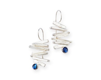 Bright silver and blue sapphire drop earrings, sculptural and architectural,  stacked bars with bezel set blue gemstone cabochons, unique