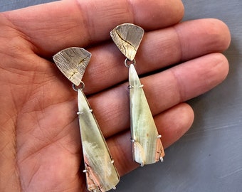 Pakistan Green Onyx stone slices, dangle prong setting with open backs in lightly oxidized sterling silver with 18k gold details.