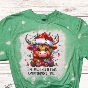 I&#39;m Fine This is Fine Everything&#39;s Fine Bleached T-Shirt w Baby Highlander Cow Wrapped in Christmas String Lights, Christmas Shirt with Cow
